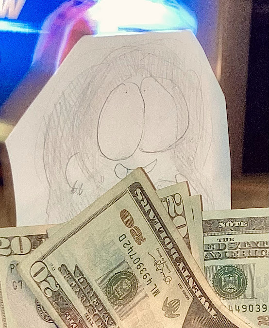 Paper doll Garcia, holding up some 20 dollar bills.